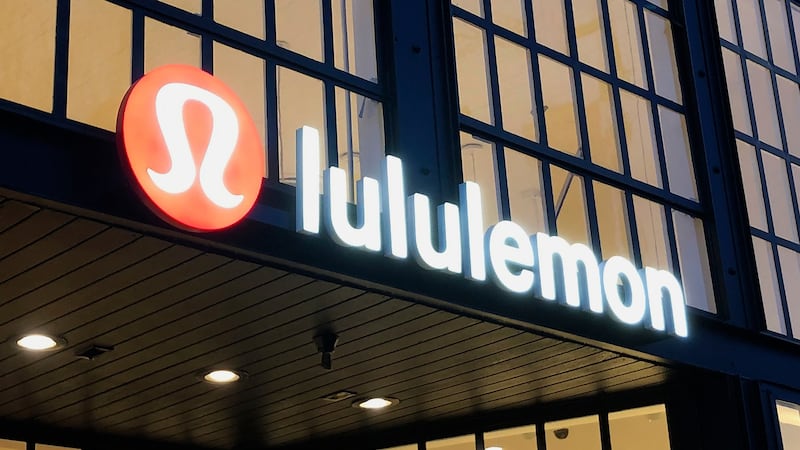 FILE - This Feb. 20, 2020 file photo shows a Lululemon sign in Burlingame, Calif. Athletic...