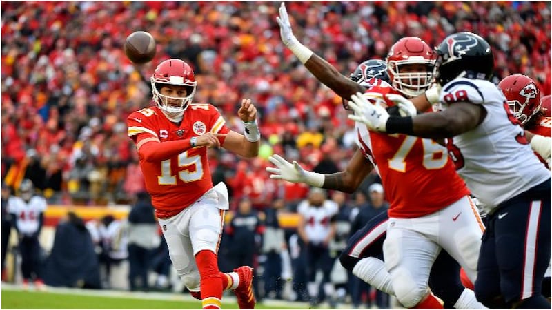 Kansas City Chiefs quarterback Patrick Mahomes (15) throws a pass during the first half of an...
