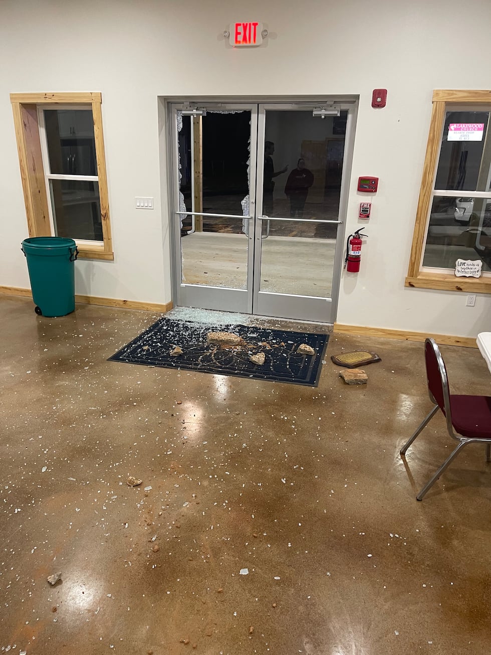 According to the SCSO, Poole shattered the glass on the front door of Lakewood Church by...