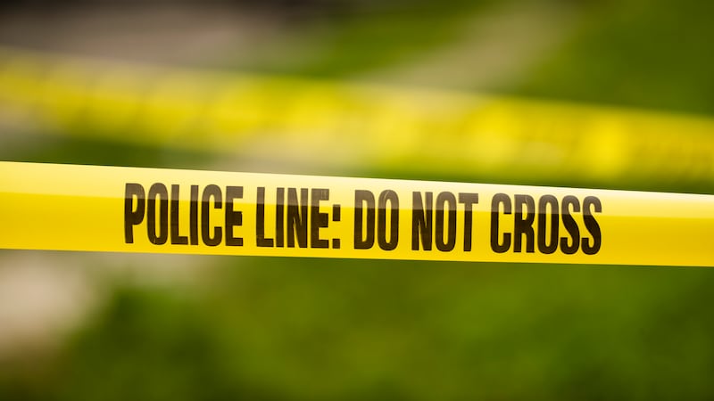 Tape cordons off the scene of a shooting in the Ogontz section of Philadelphia, Thursday, Aug....