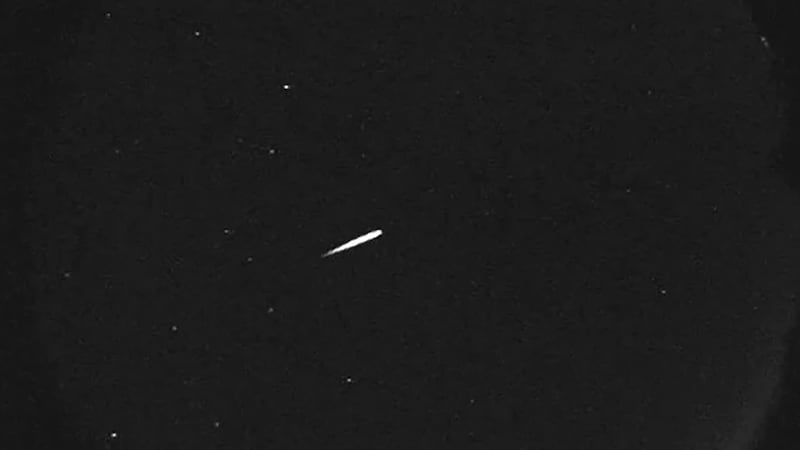 This photo provided by NASA shows a meteor from the Orionid shower on Oct. 13, 2015. (Jet...