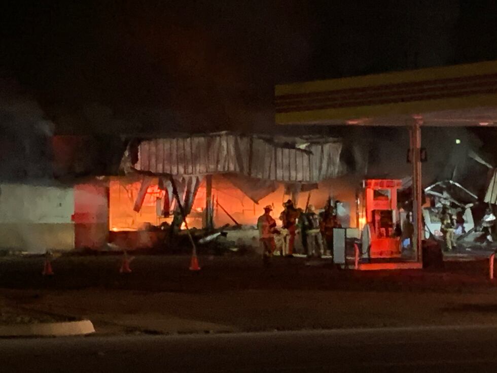Fire crews monitor building after large fire at CEFCO in Chapel Hill.