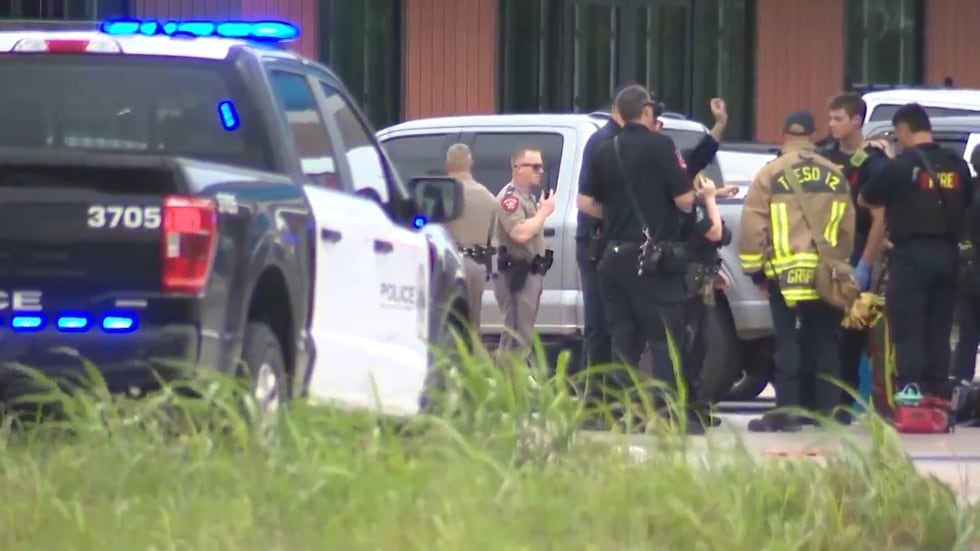 In this image taken from video provided by KVUE, emergency cervices work on a site of a...