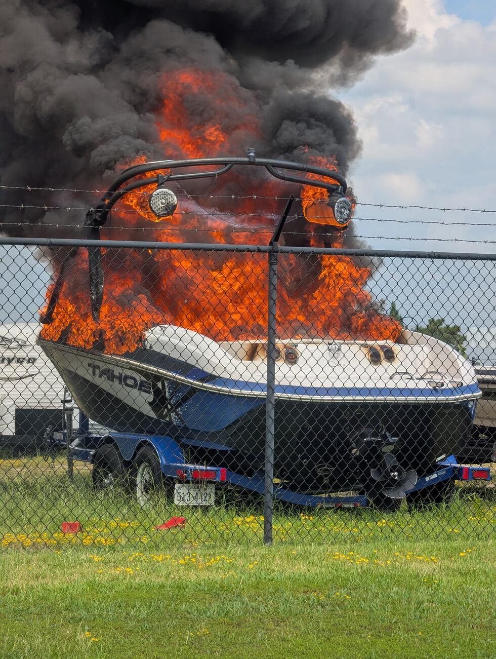 Whitehouse fire and police are on the scene of a boat burning at Lake Tyler Self Storage.