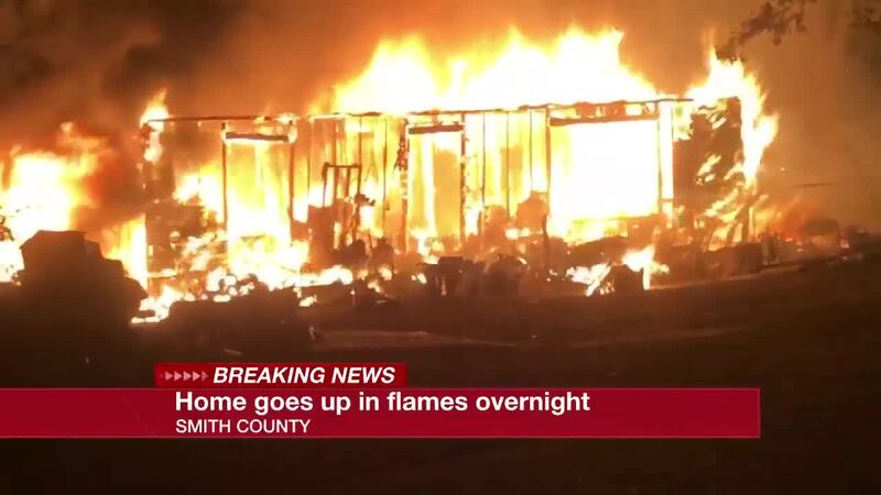 Multiple fire departments battle overnight house fire in Smith County