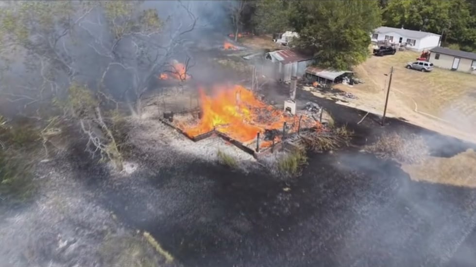 Two people are displaced after a Wednesday fire destroyed a Kilgore home and spread to the...