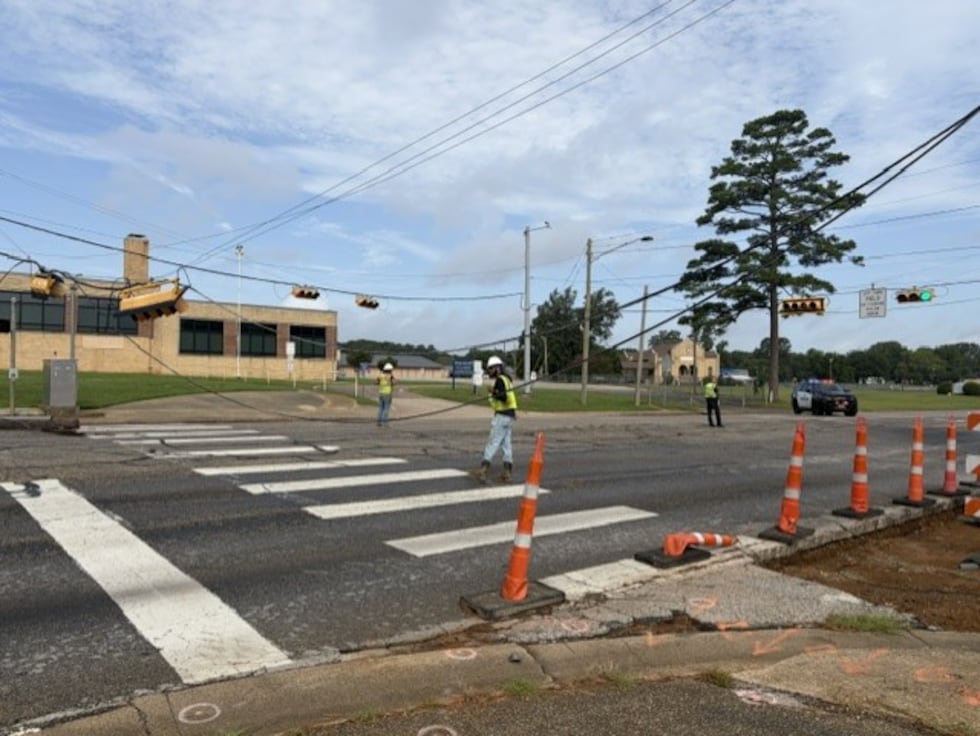 A passing 18-wheeler pulled a stoplight down on Pine Tree Road in Longview.