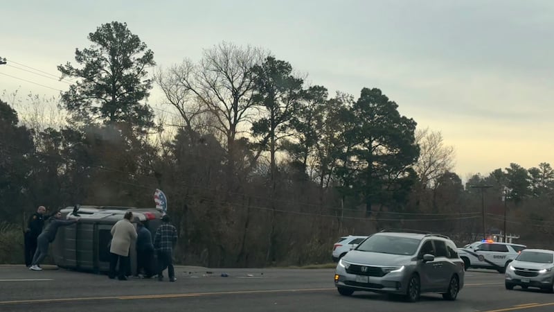 A crash has left one vehicle overturned and traffic slowed down on a road in Smith County.