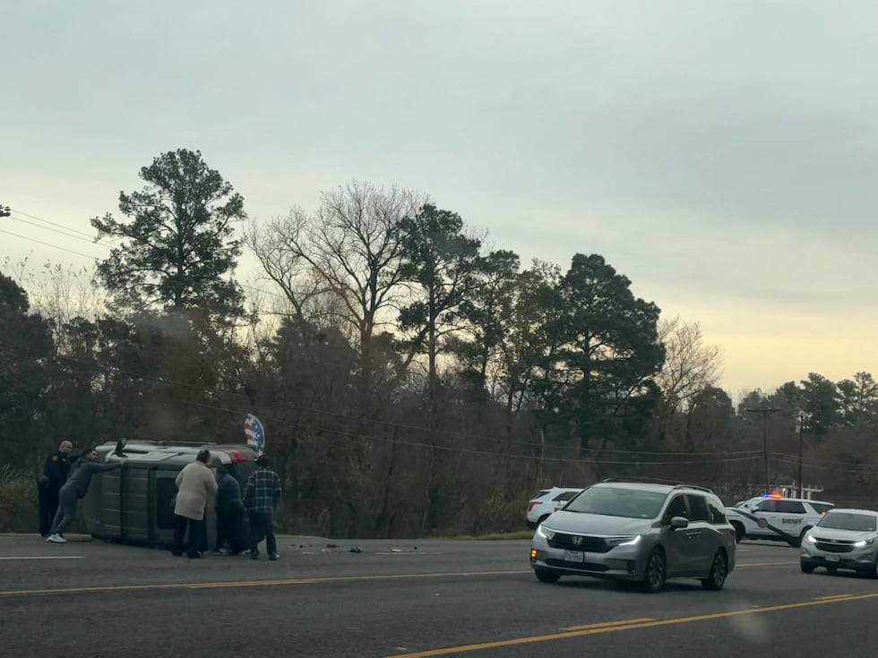 A crash has left one vehicle overturned and traffic slowed down on a road in Smith County.