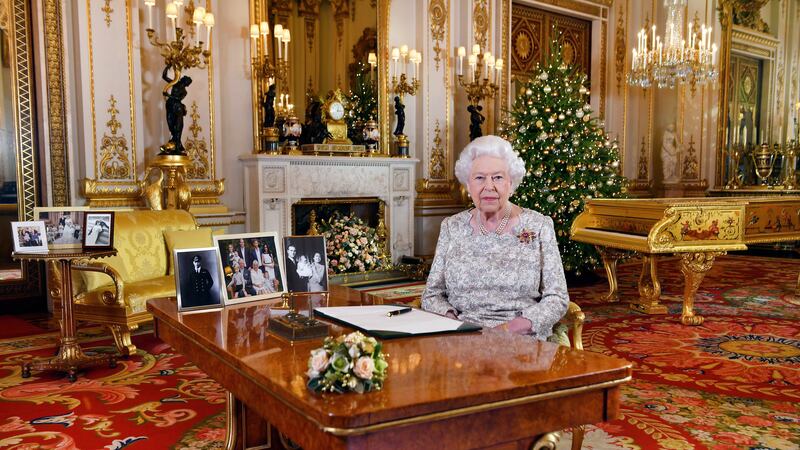 In this image released on Tuesday, Dec. 25, 2018, Britain's Queen Elizabeth poses for a...