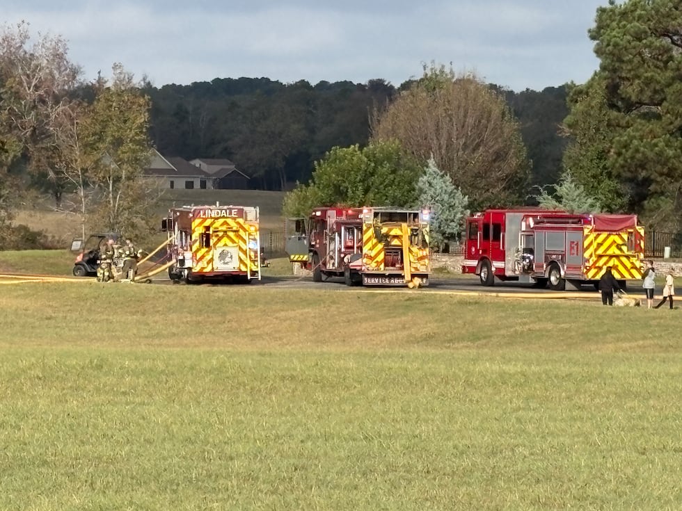 Multiple fire crews are responding to a house on fire near Lindale.