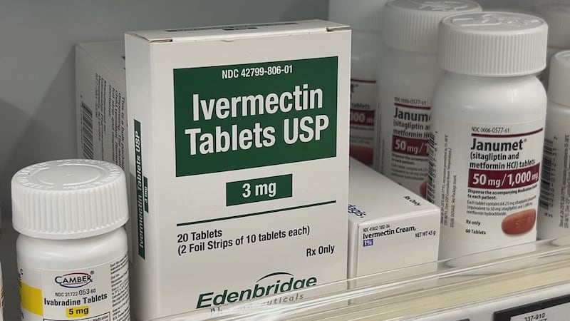 A box of ivermectin sits behind the counter at Drug Emporium in Tyler.