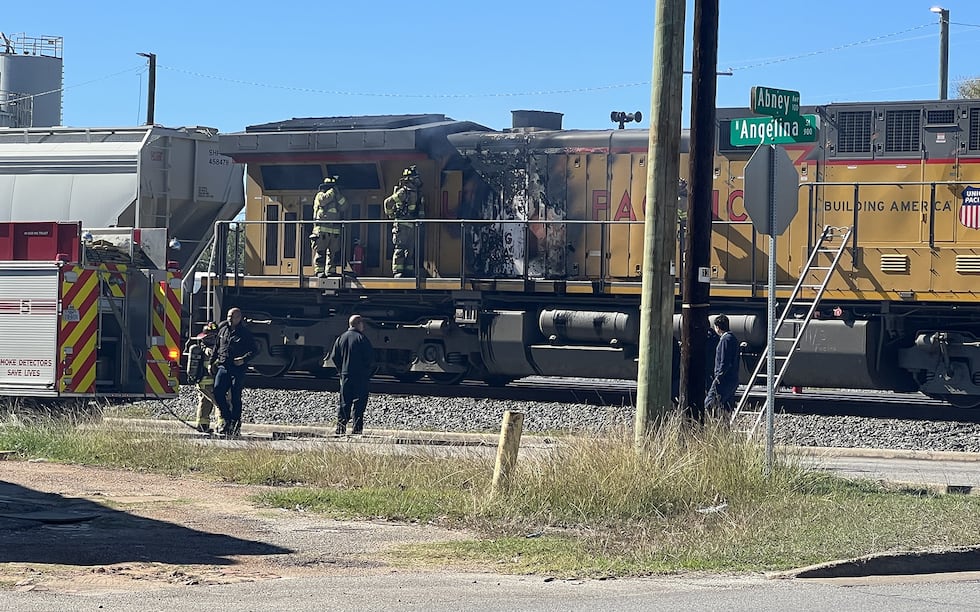 A Lufkin intersection is closed while emergency personnel investigate a train fire.