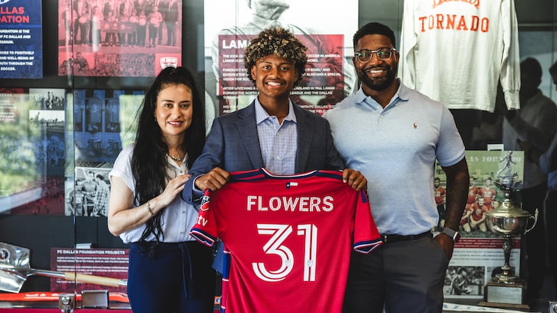Benji Flowers with his mom and dad at his contract signing with FC Dallas