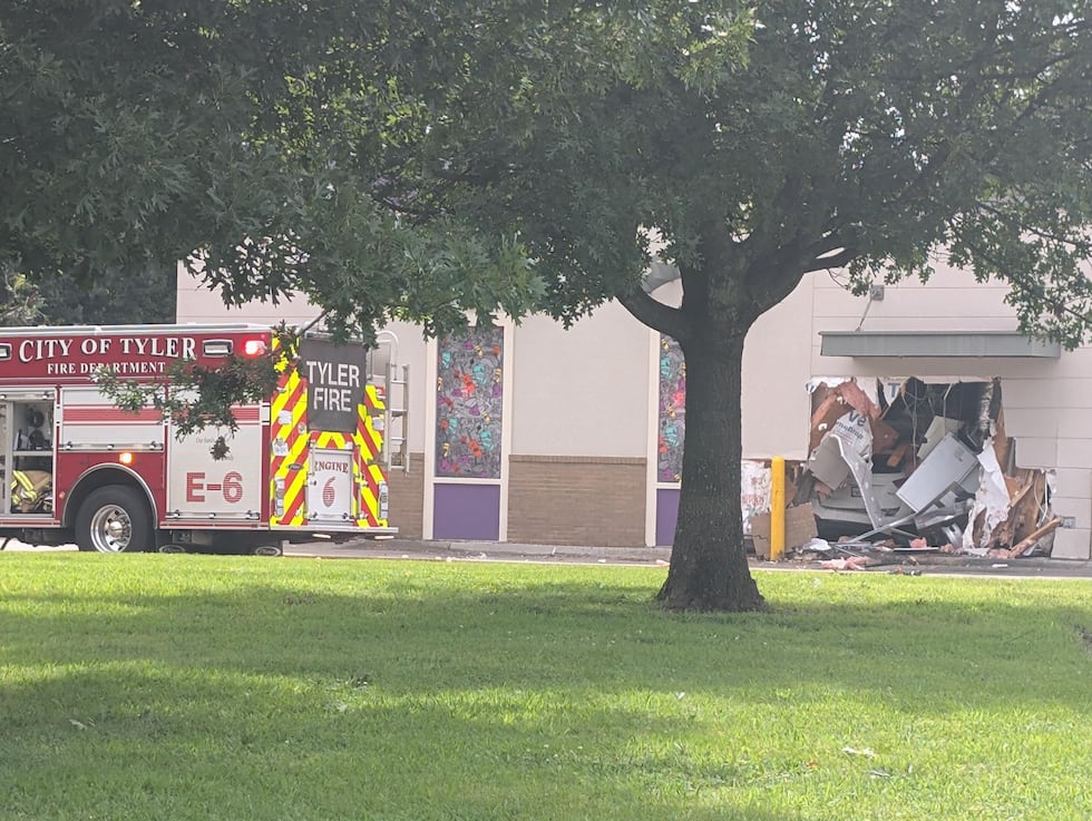 Several people are injured and a road is blocked off after a car crashed into a Taco Bell,...