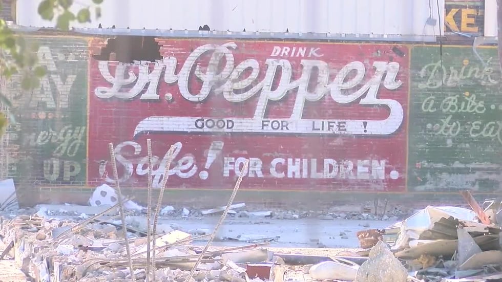 The City of Lufkin uncovered a Dr Pepper mural during the demolition of the old county jail...