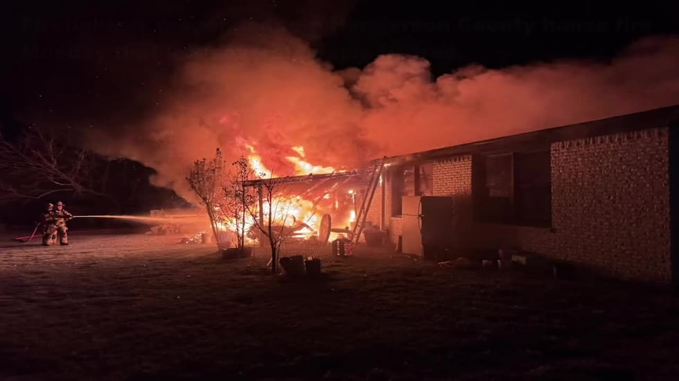 11 escape, several injured from Henderson County housefire