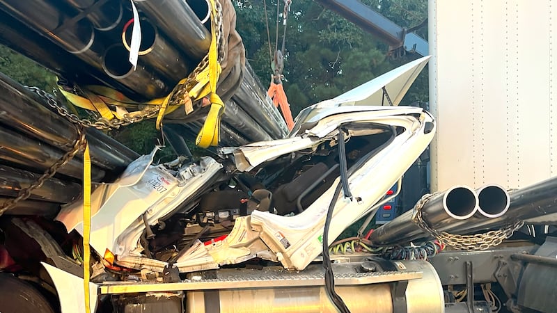 Lufkin firefighters extract trapped 18-wheeler driver from smashed cab following collision