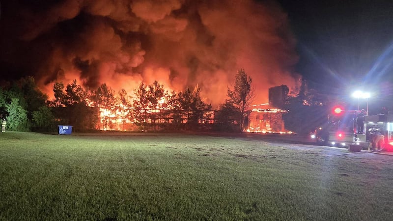 A fire destroyed the old Warren Junior High School early Sunday morning.