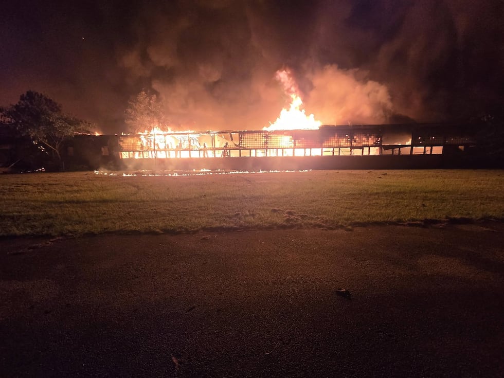 A fire destroyed the old Warren Junior High School early Sunday morning.