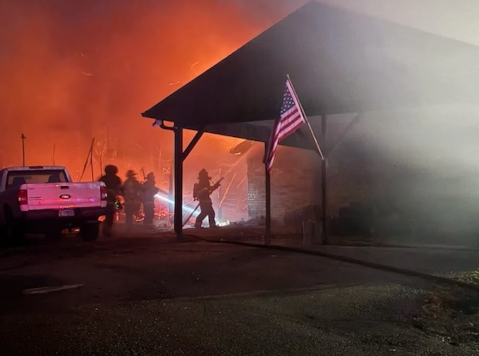 Smith County firefighters battling burning home near Tyler Pounds