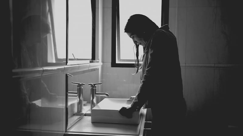 File photo of person struggling with domestic abuse.