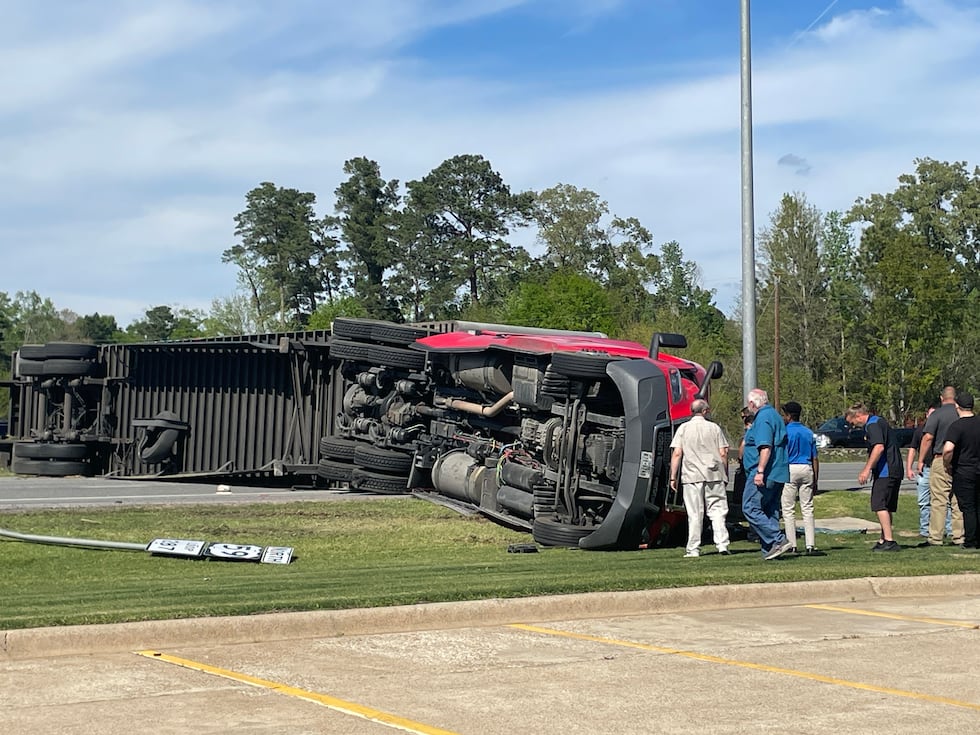 An overturned 18-wheeler is blocking all eastbound lanes on the Lufkin loop.