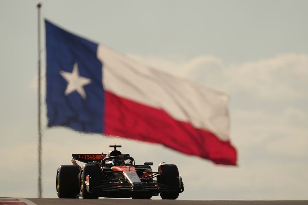 McLaren driver Oscar Piastri of Australia steers his car during the qualification for the...