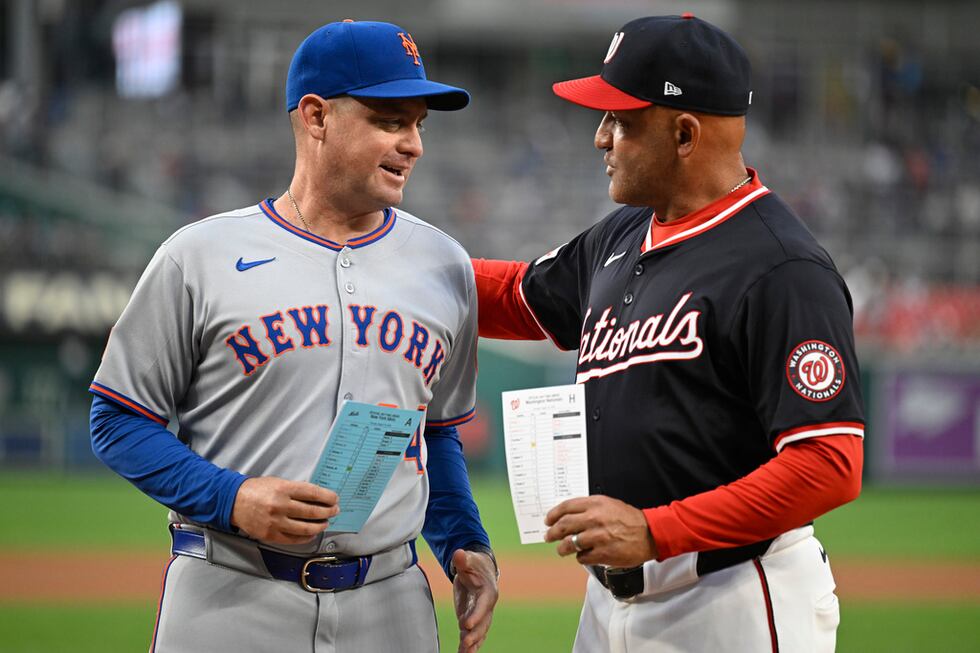 New York Mets manager Carlos Mendoza, and Washington Nationals interim manager Miguel Cairo...