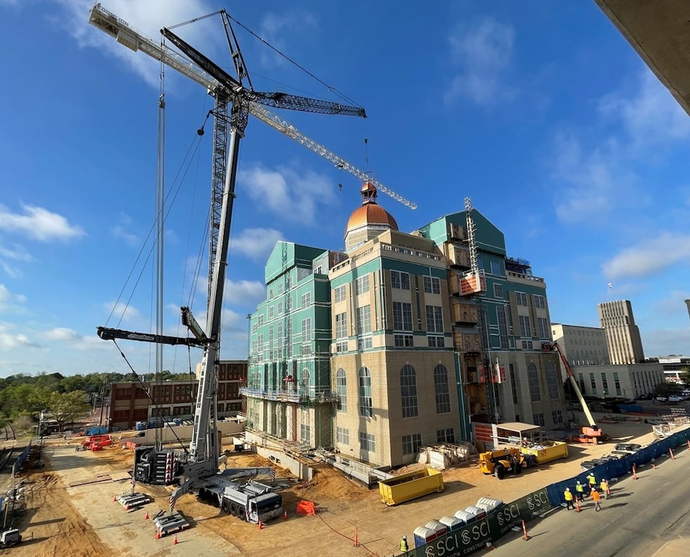 The new Smith County Courthouse reached a key construction milestone Monday as crews installed...
